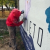 Maľba na betónovom plote pri obnovenom parčíku Antona Srholca