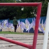 Maľba na betónovom plote pri obnovenom parčíku Antona Srholca
